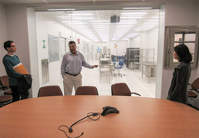 Dr. Nasir Basit shows students around the NUFAB facility.
