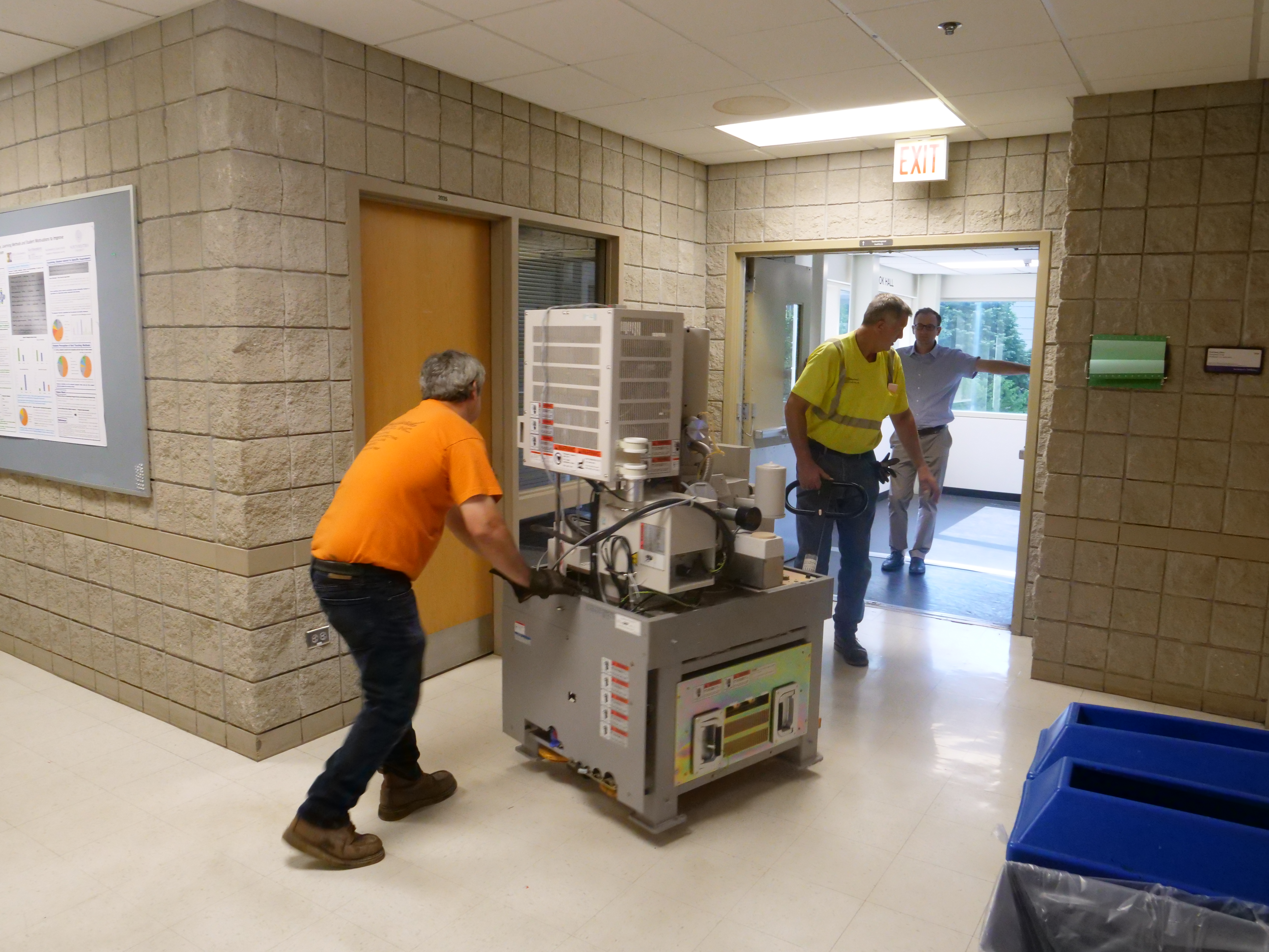 The microscope is rolled into the tunnel connecting Cook Hall and the Tech Institute.