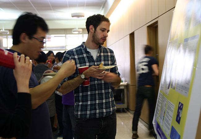 checking out the posters