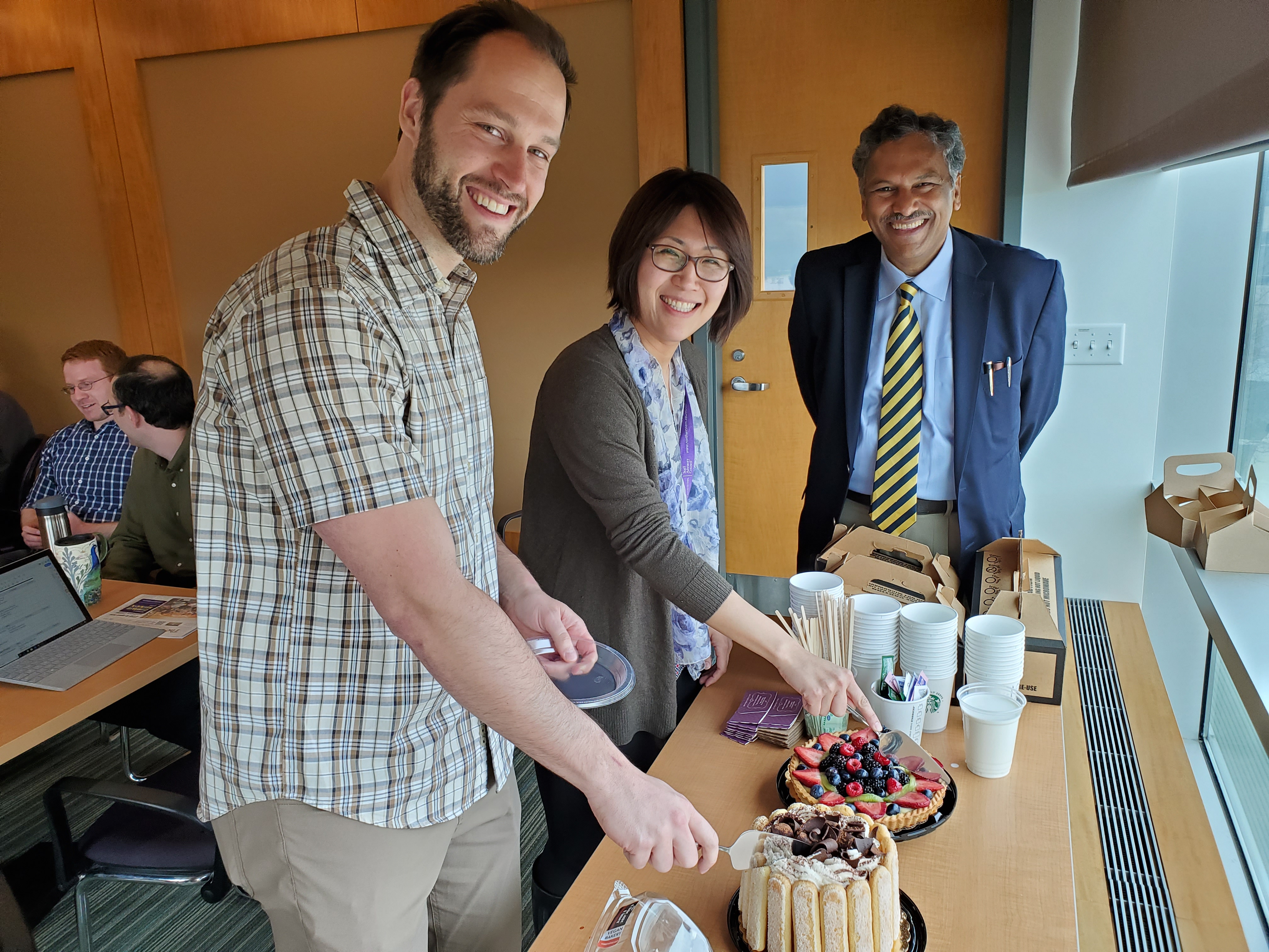 Paul Smeets and Young Kasaraski with cake