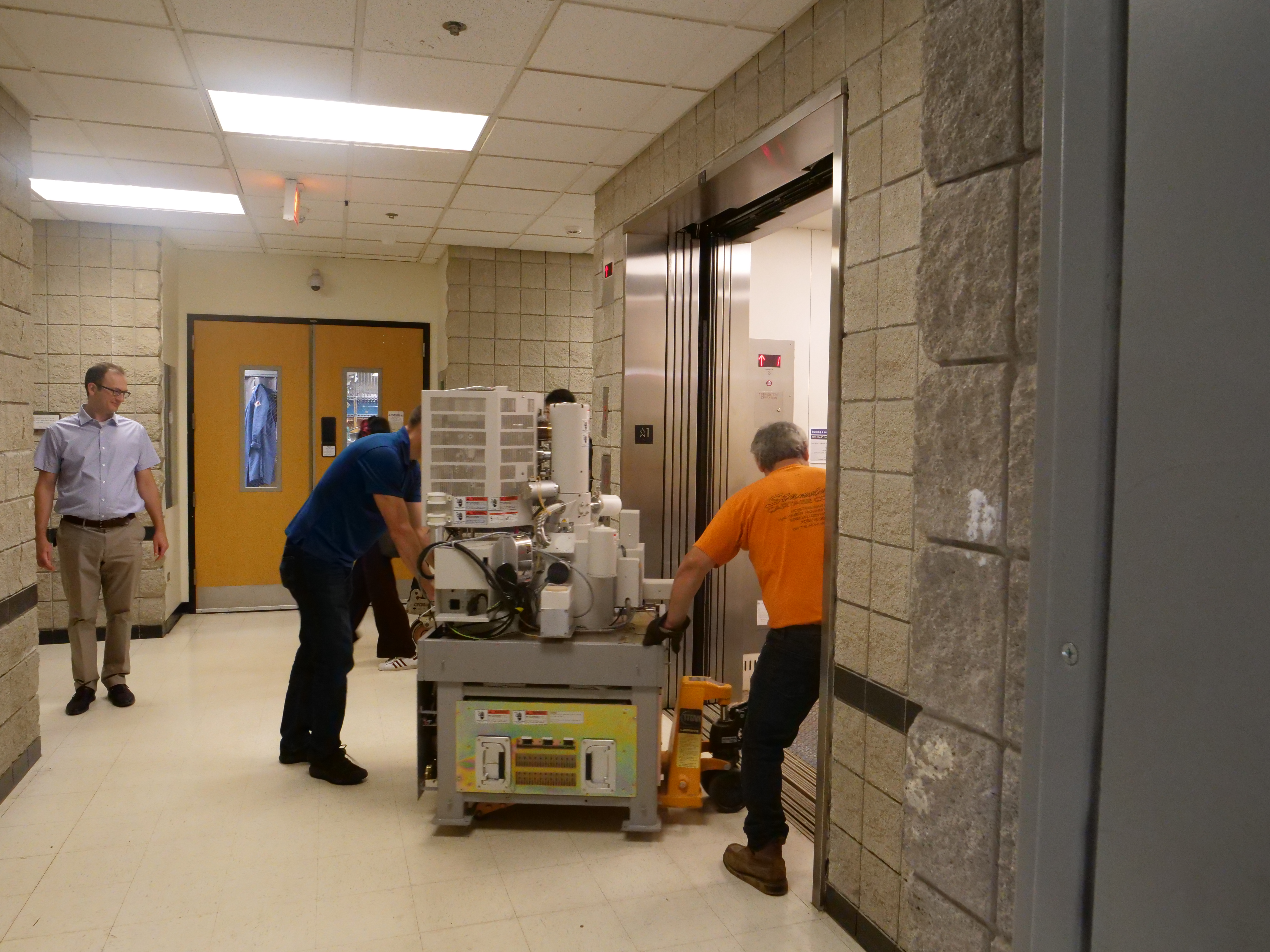 moving the microscope into the elevator
