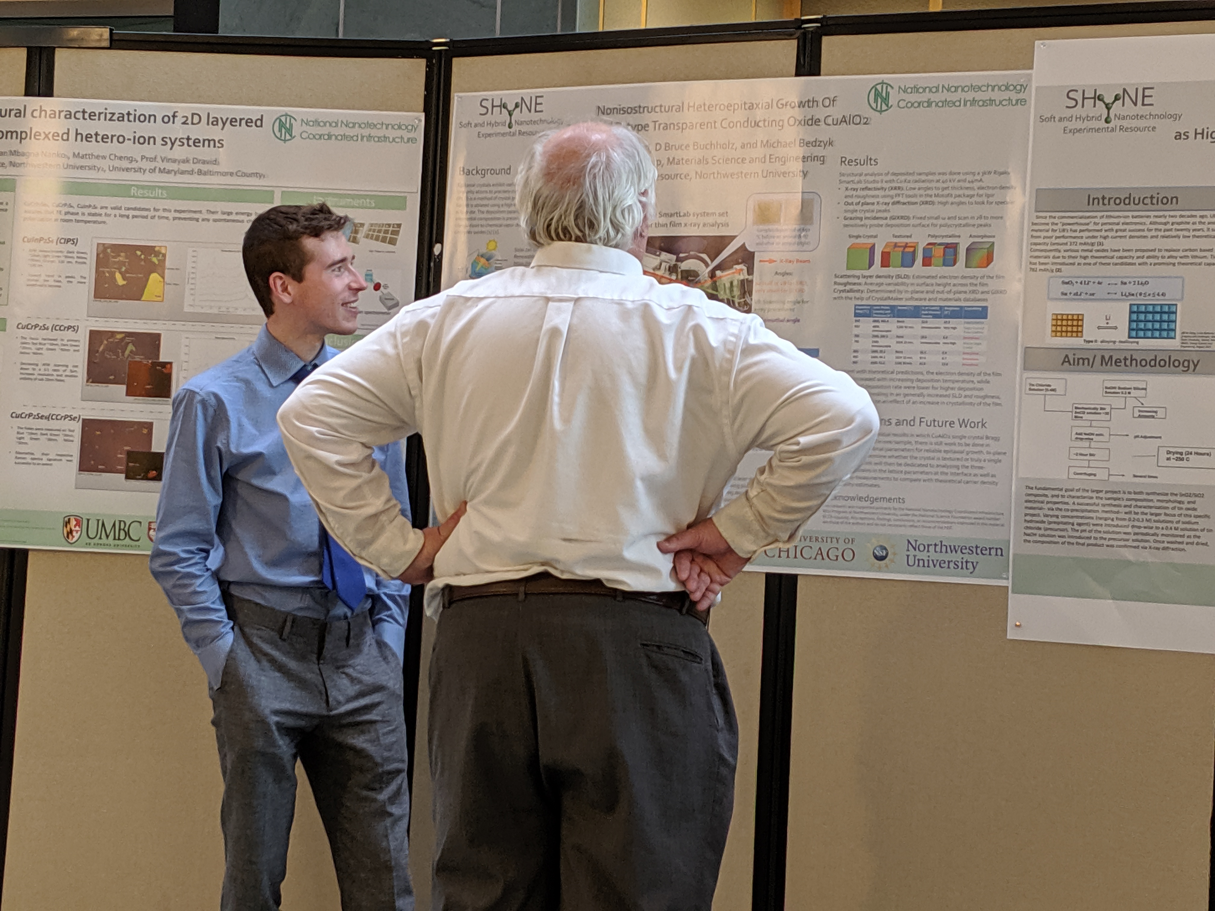 REU conner with his poster