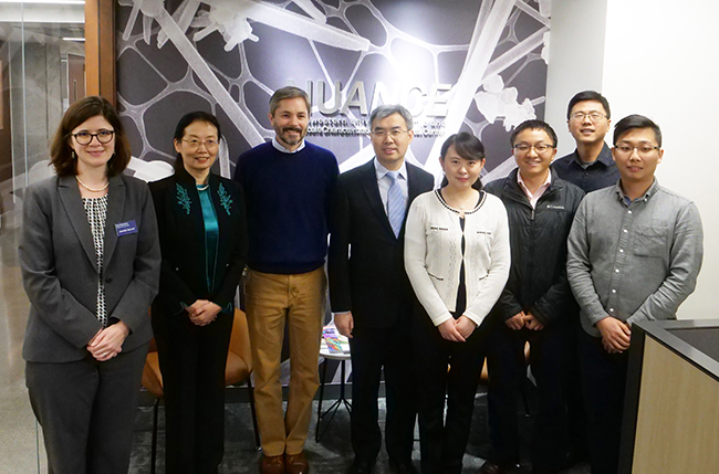group pic of NUANCE with Consul General