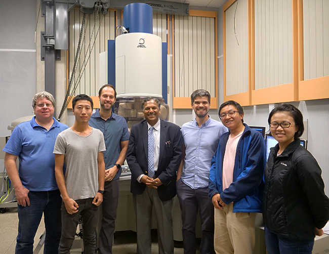 group pic of technicians by the ARM 200CF