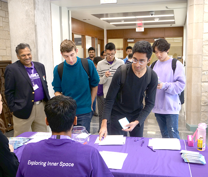 students signing into NUANCE Fest