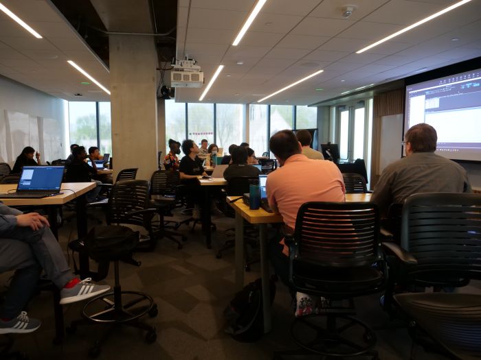 attendees reviewing data sets